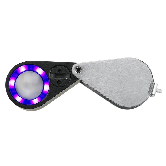 Handheld loupe magnifier with UV/LED ring light turned on, on a white background