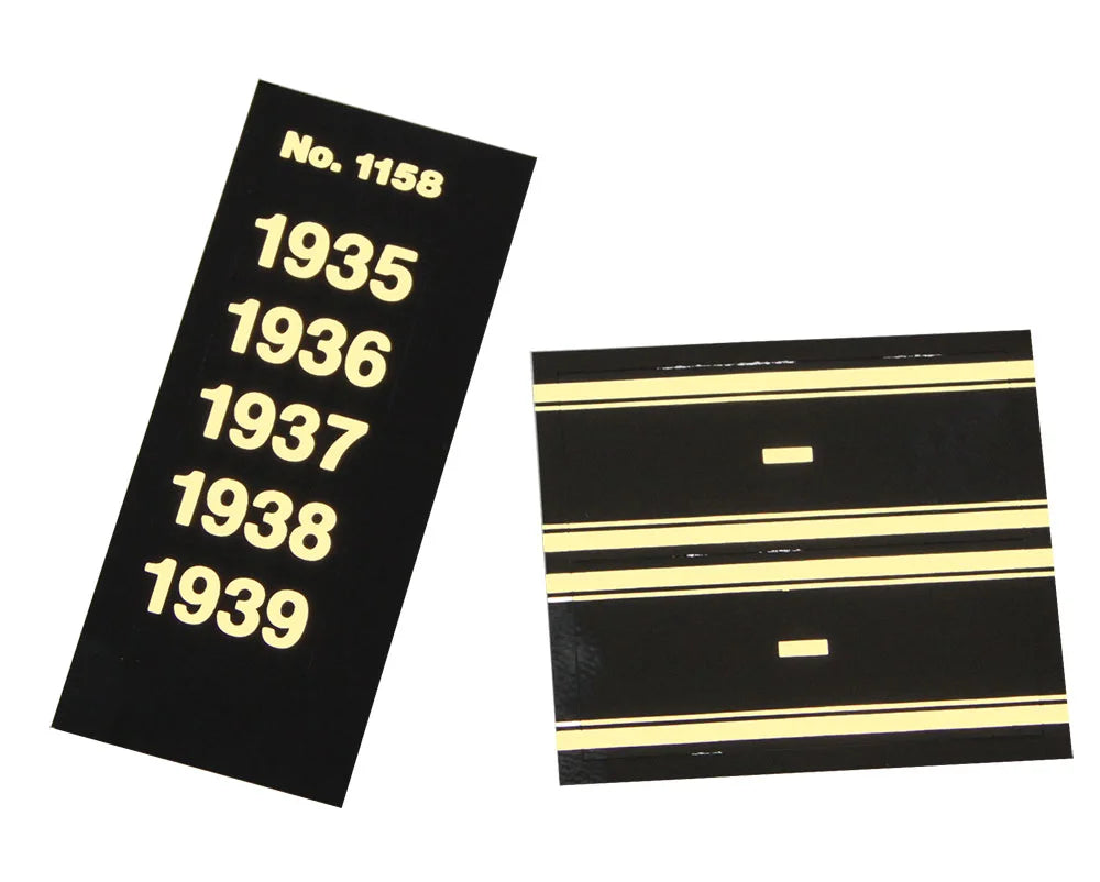 Black label strip with gold text displaying years 1935 to 1939 and the black and gold base label with hyphen for album spine labeling/organizing on a white background