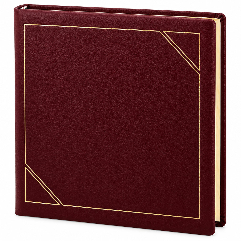 A burgundy genuine leather album with gold foil decorative borders, shown at a three-quarter angle against a plain white background.
