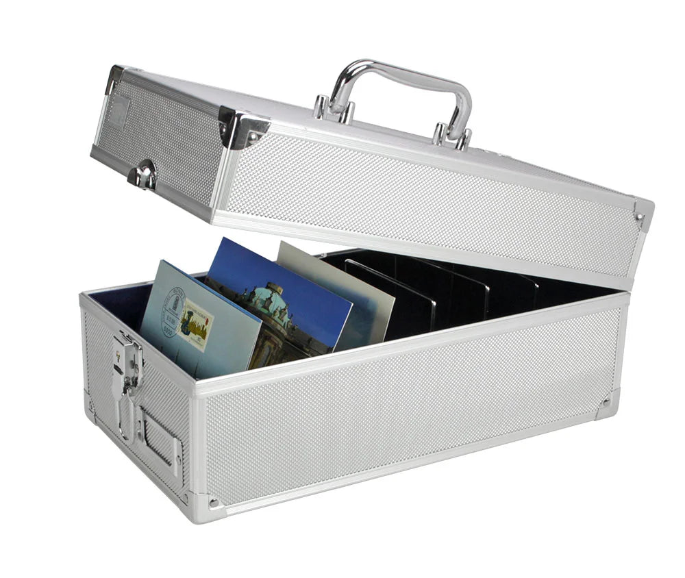 Silver aluminum case with carrying handle with open lid showing postcards on a white background