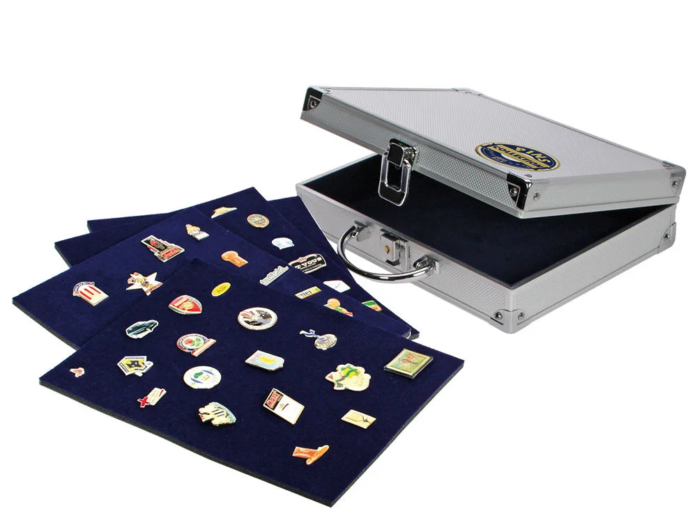 Silver aluminum case ajar with carrying handle and a collectors emblem on the lid, with blue velvet trays filled with collector pins against a white background