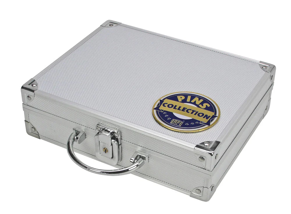 Silver aluminum case with carrying handle and a collectors emblem on the lid against a white background