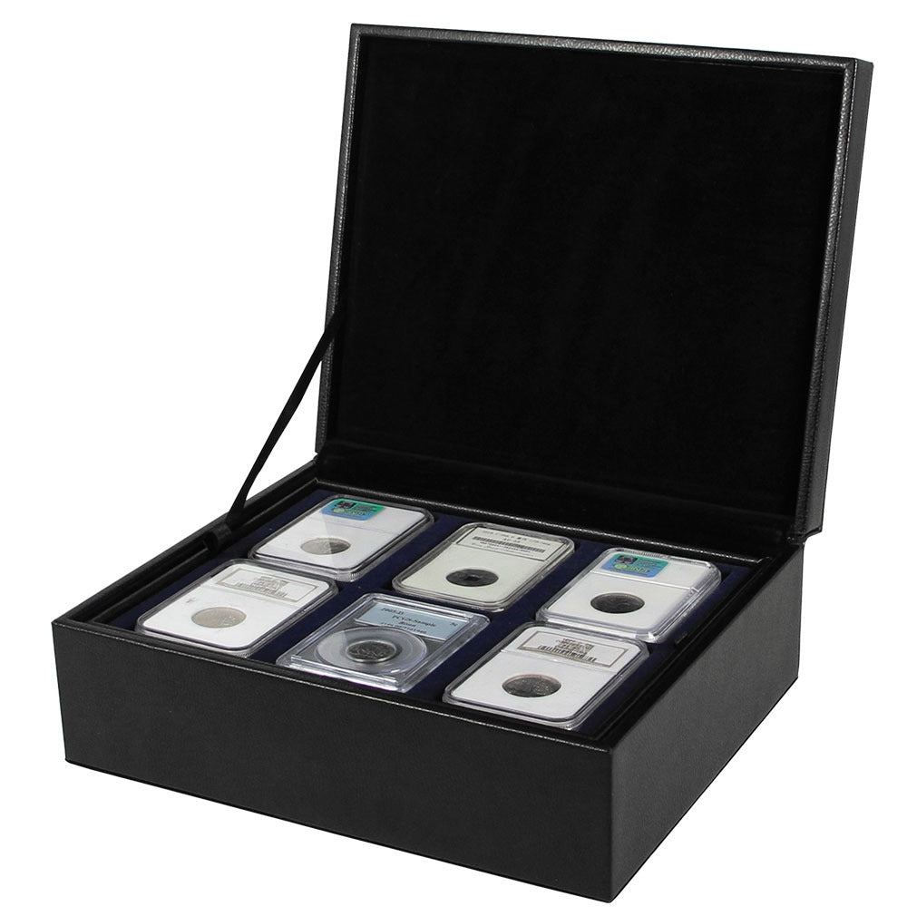 Collection of graded coin slabs on a blue velvet tray in an open black leather display case, on a white background.
