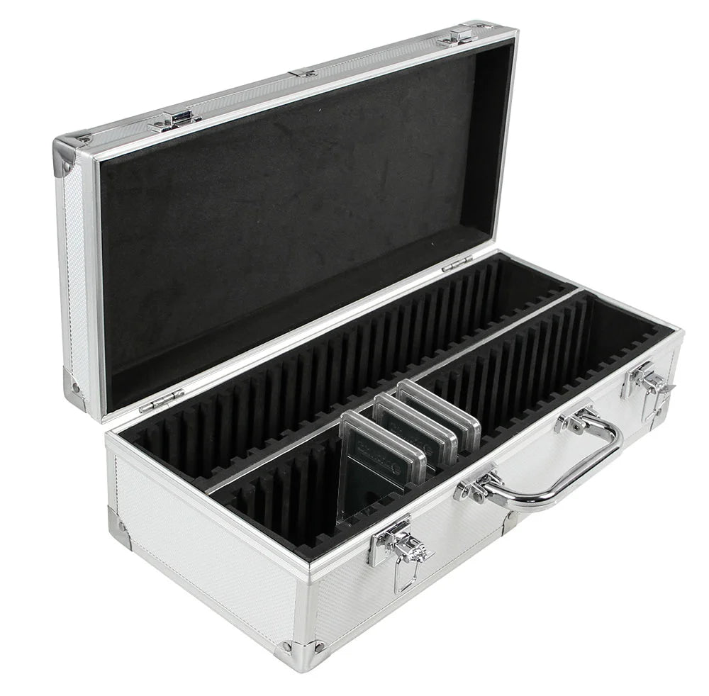 Aluminum coin slab case open with foam compartments holding certified coin slabs