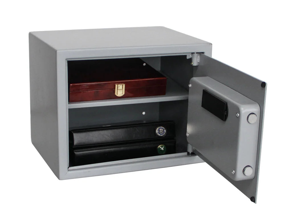 Gray safe with open door revealing a SAFE burlwood coin case and two black SAFE albums inside on a white background