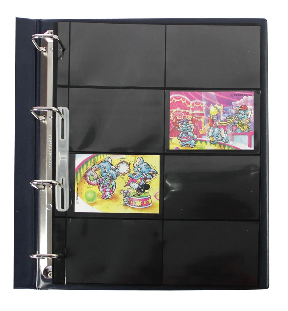 Open blue collection album displaying a page with kinder egg puzzles on a white background