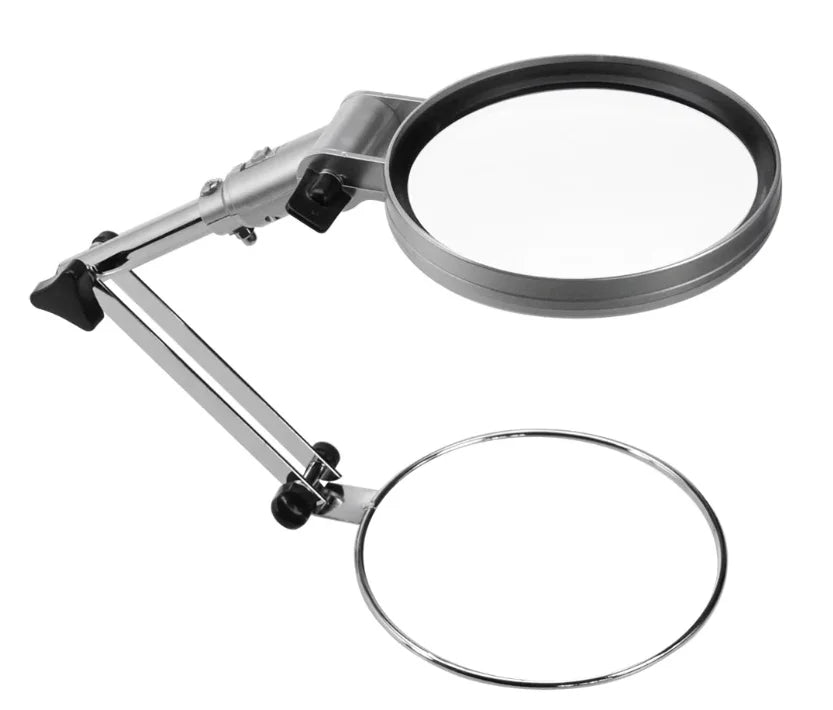 Metal magnifying glass with adjustable arm with black fixtures on a white background