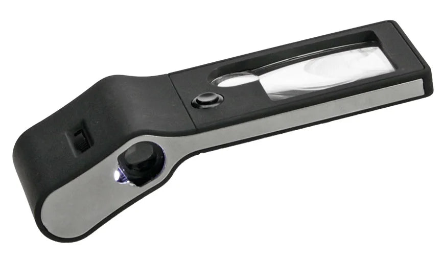 Two lens, black magnifying glass with LED and UV light with focus wheel on a white background
