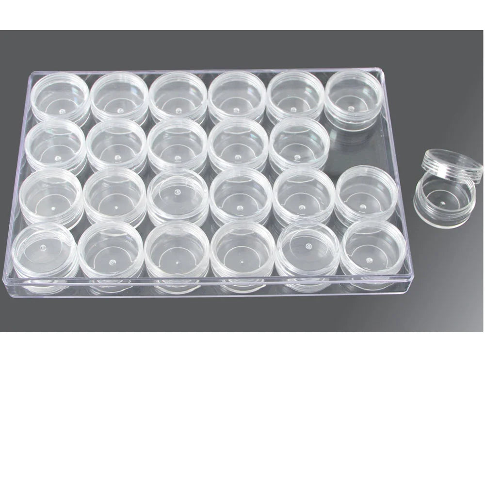 Clear plastic container with 24 small removable round jars on a grey background