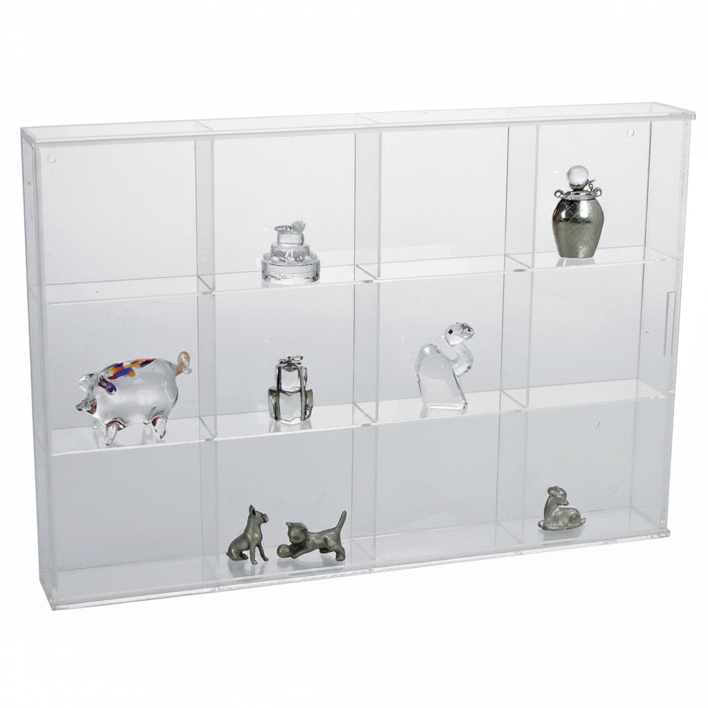Clear acrylic display case with 12 compartments filled with various small sculptures and collectibles on a white background