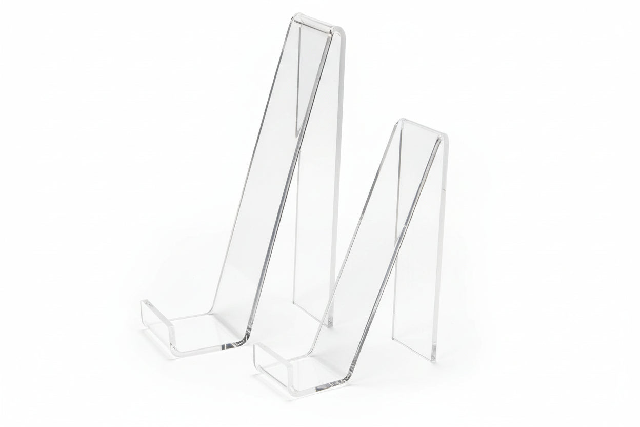 Two different size clear acrylic angled display easel stands on a white background