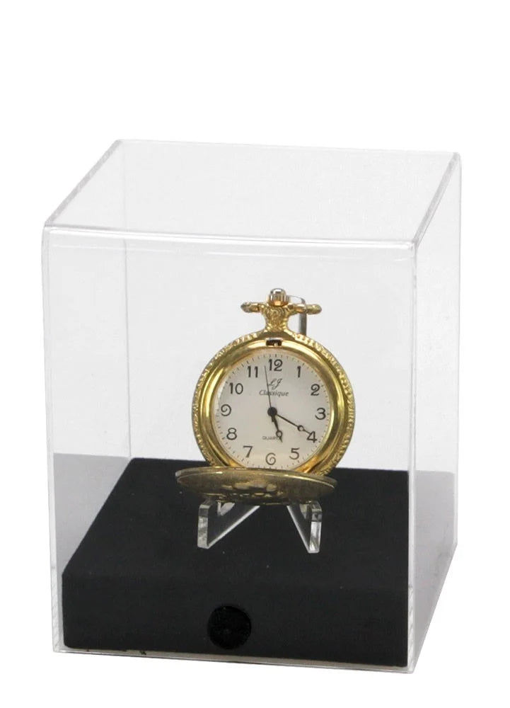 Pocket watch propped up on an easel, inside an acrylic display case with a black base on a white background