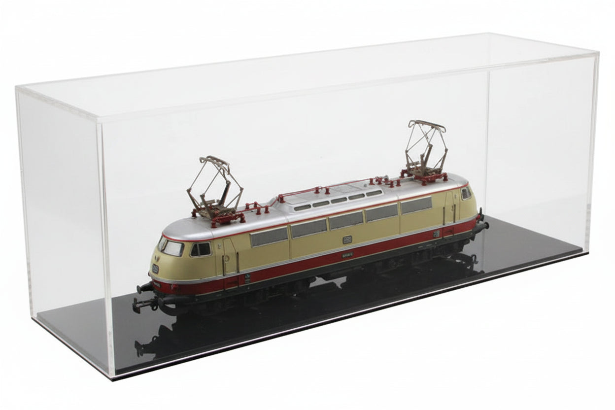 Model train in a clear acrylic display case  with black bottom on a white background