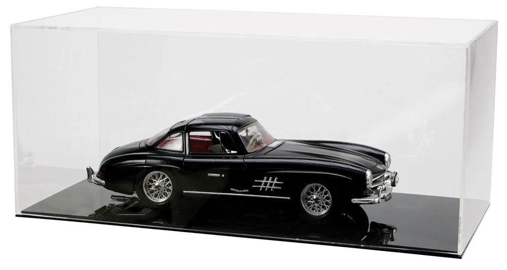 Black model car in a clear acrylic display case  with black bottom on a white background