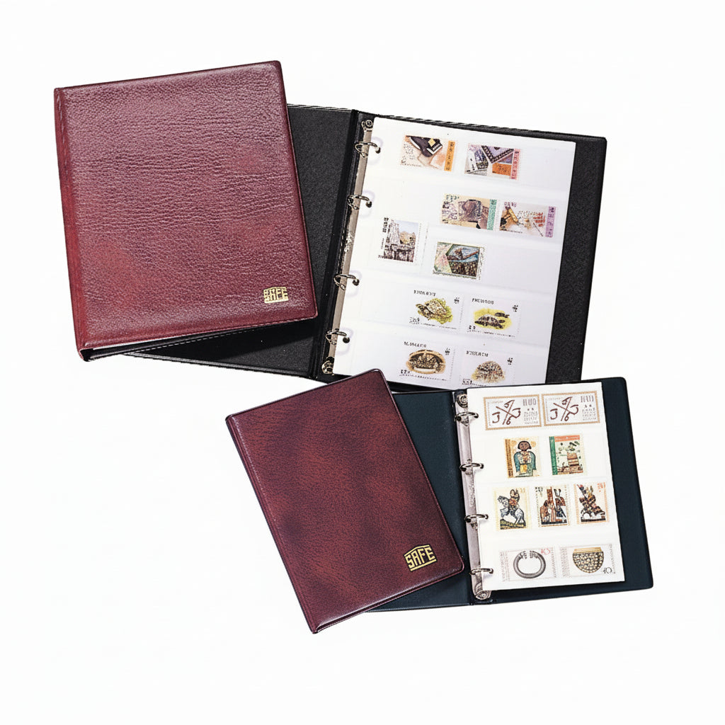 Standard and mini sized red stamp albums opened up with colorful stamps on a white background