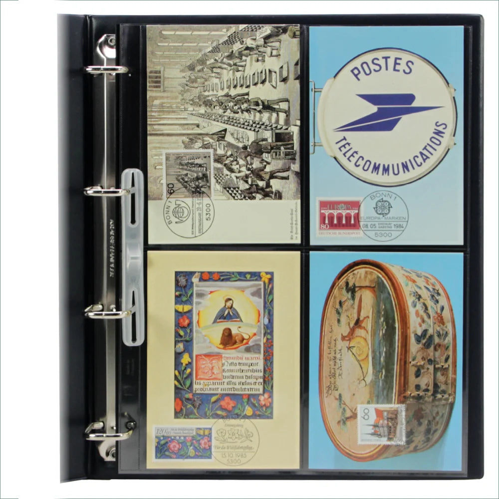 Open collection album displaying a page with 4 collectible vintage postcards on a white background