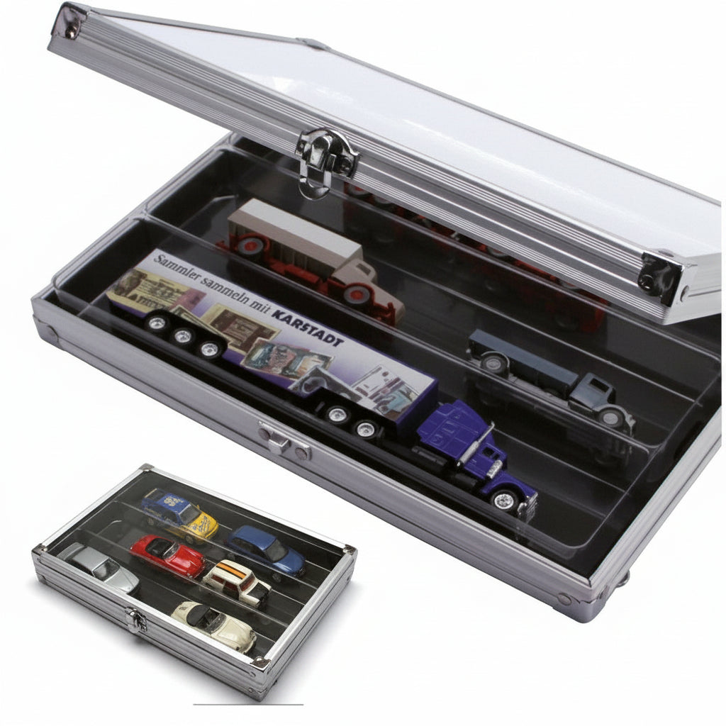 Aluminum display case with 3 compartments filled with model trains, open ajar with an acrylic lid on a white background