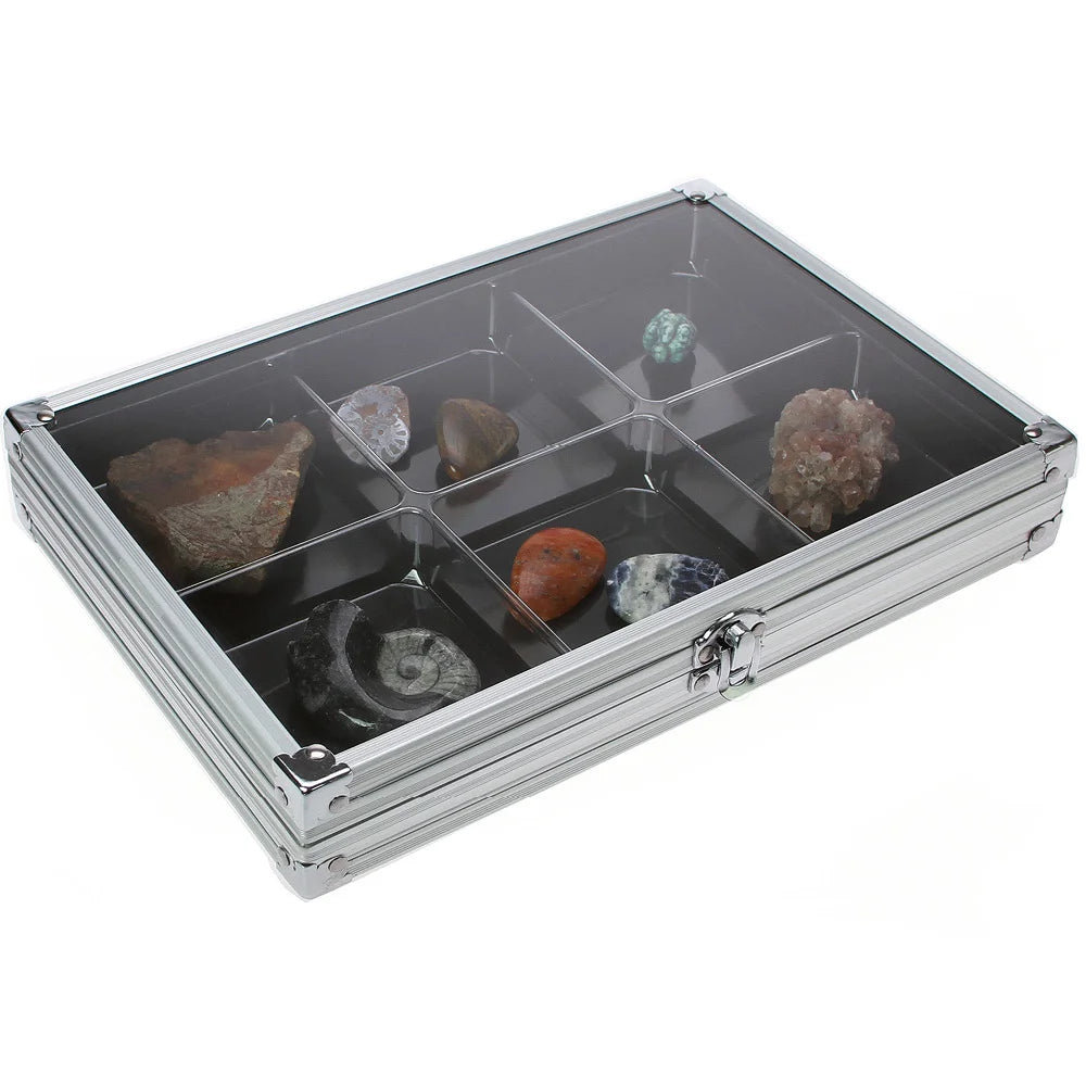 Aluminum display case with 6 compartments filled with rocks & minerals, closed with an acrylic lid on a white background