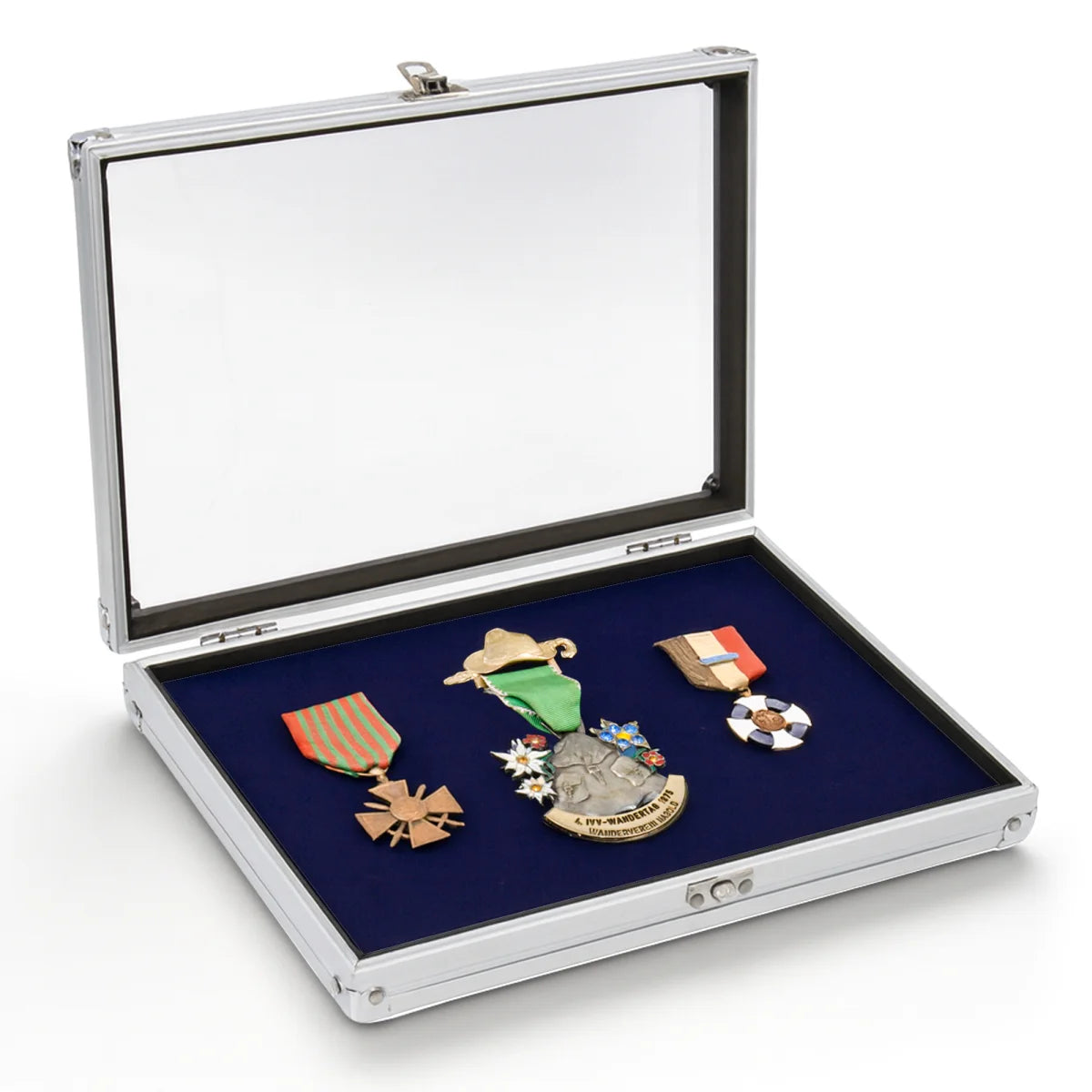 Collection of military medals in an aluminum display case with acrylic lid on a white background