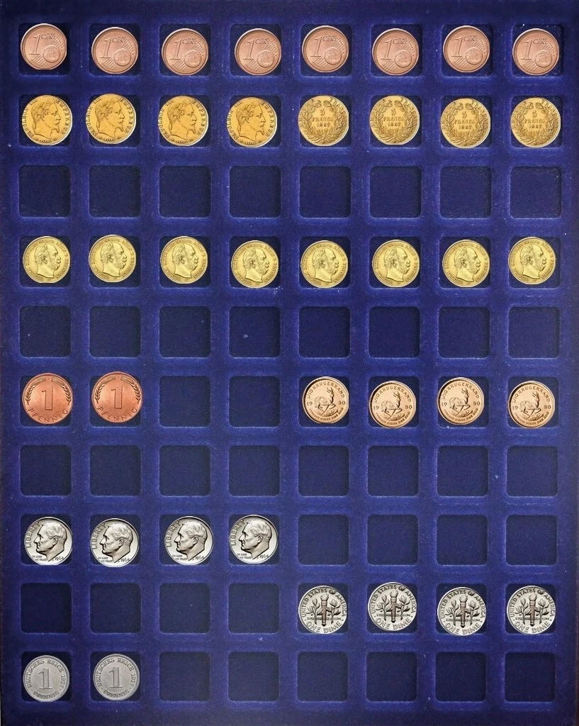 A collection of European coins arranged in a blue velvet coin tray featuring copper, gold, and silver denominations.