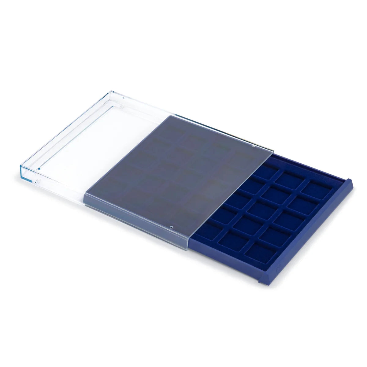 Open acrylic stackable drawer unit with a blue velvet tray and square compartments for coins on a white background