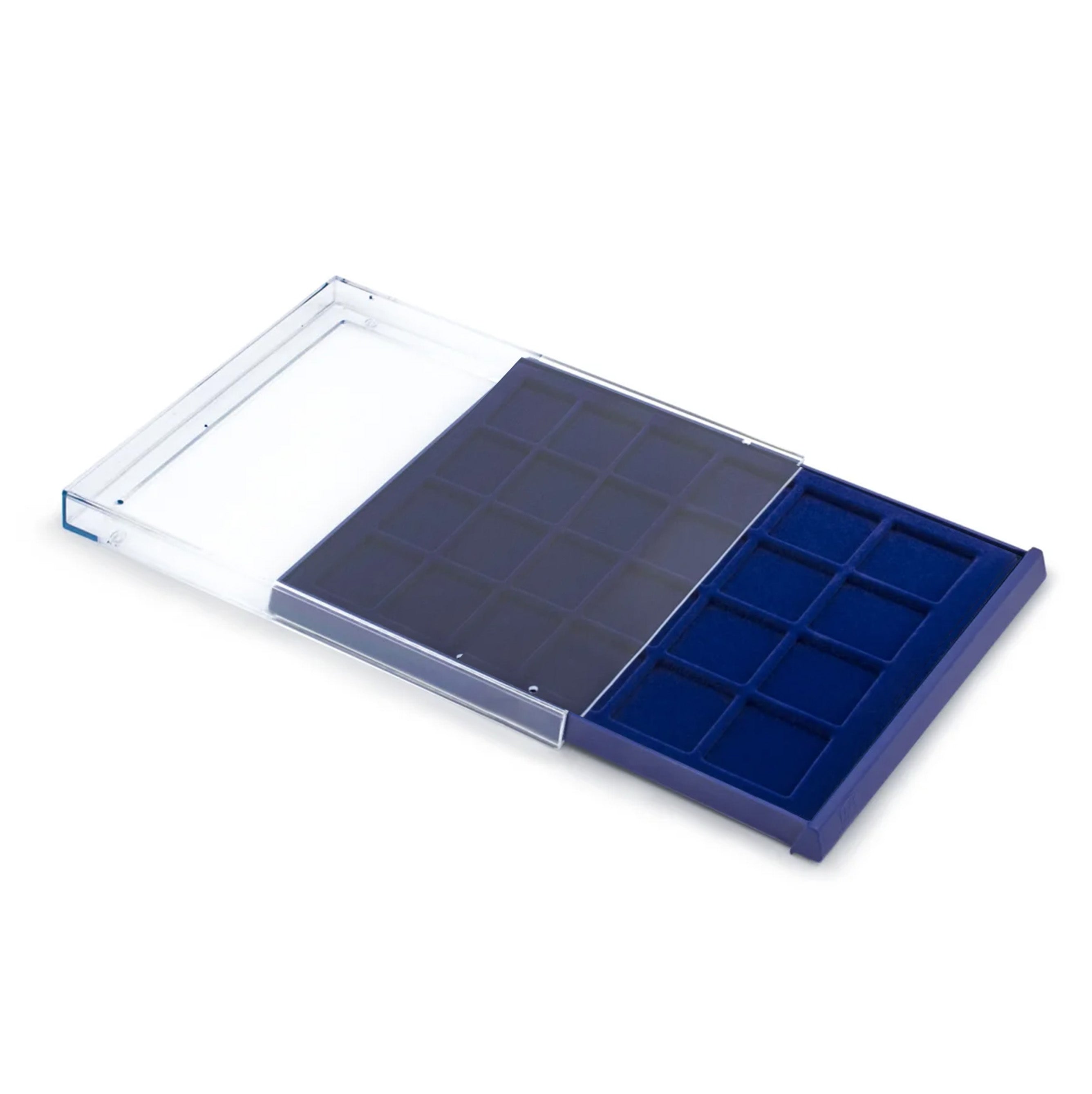 Open acrylic stackable drawer unit with a blue velvet tray and square compartments for coins on a white background