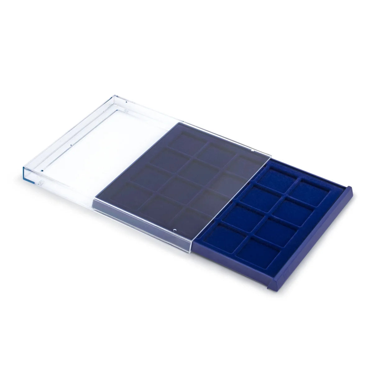 Open acrylic stackable drawer unit with a blue velvet tray and circular compartments for coins on a white background