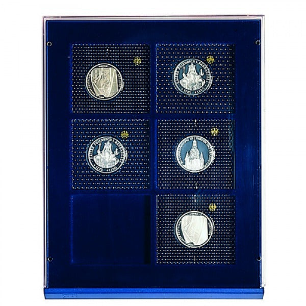 Overhead shot of acrylic stackable drawer unit with a blue velvet tray and rectangular compartments holding coins on a white background