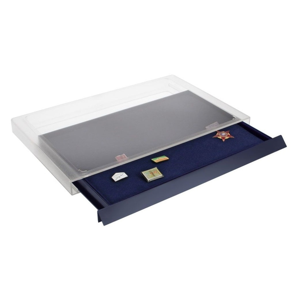 Display drawer unit with a clear acrylic casing and blue interior, containing a collection of pins on a white background.