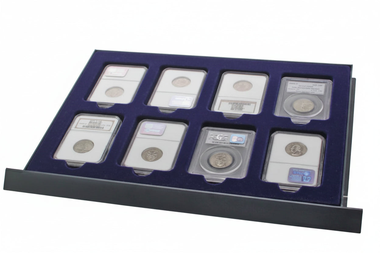 Coin display drawer tray with blue interior, containing a graded coin slabs on a white background.