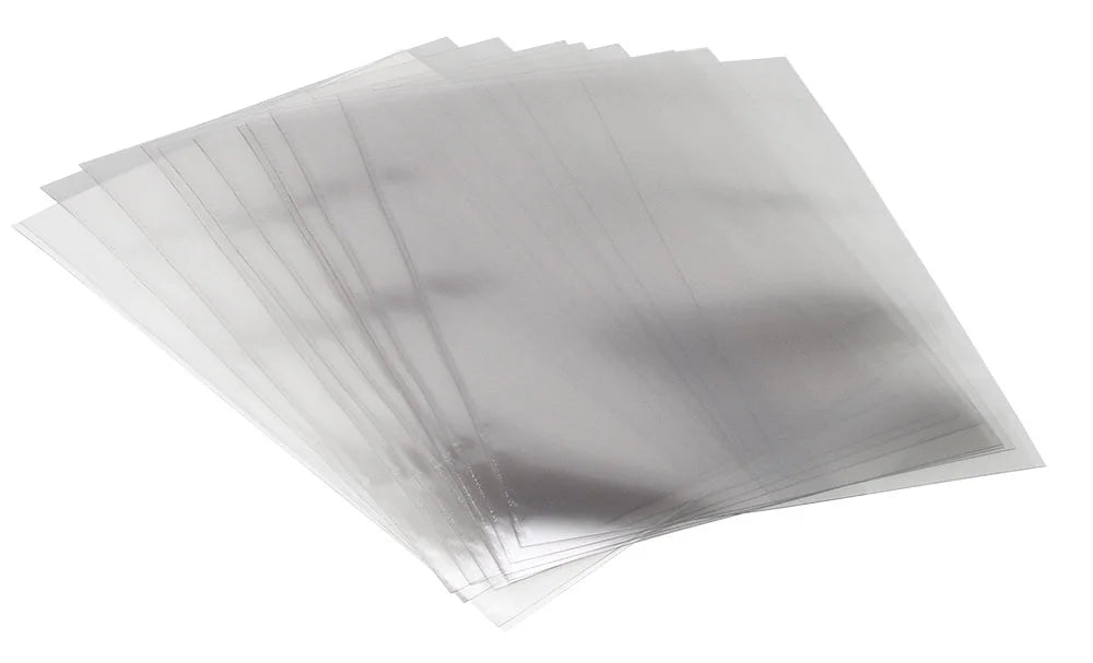 Clear archival polyester sleeves / protective covers on a white background