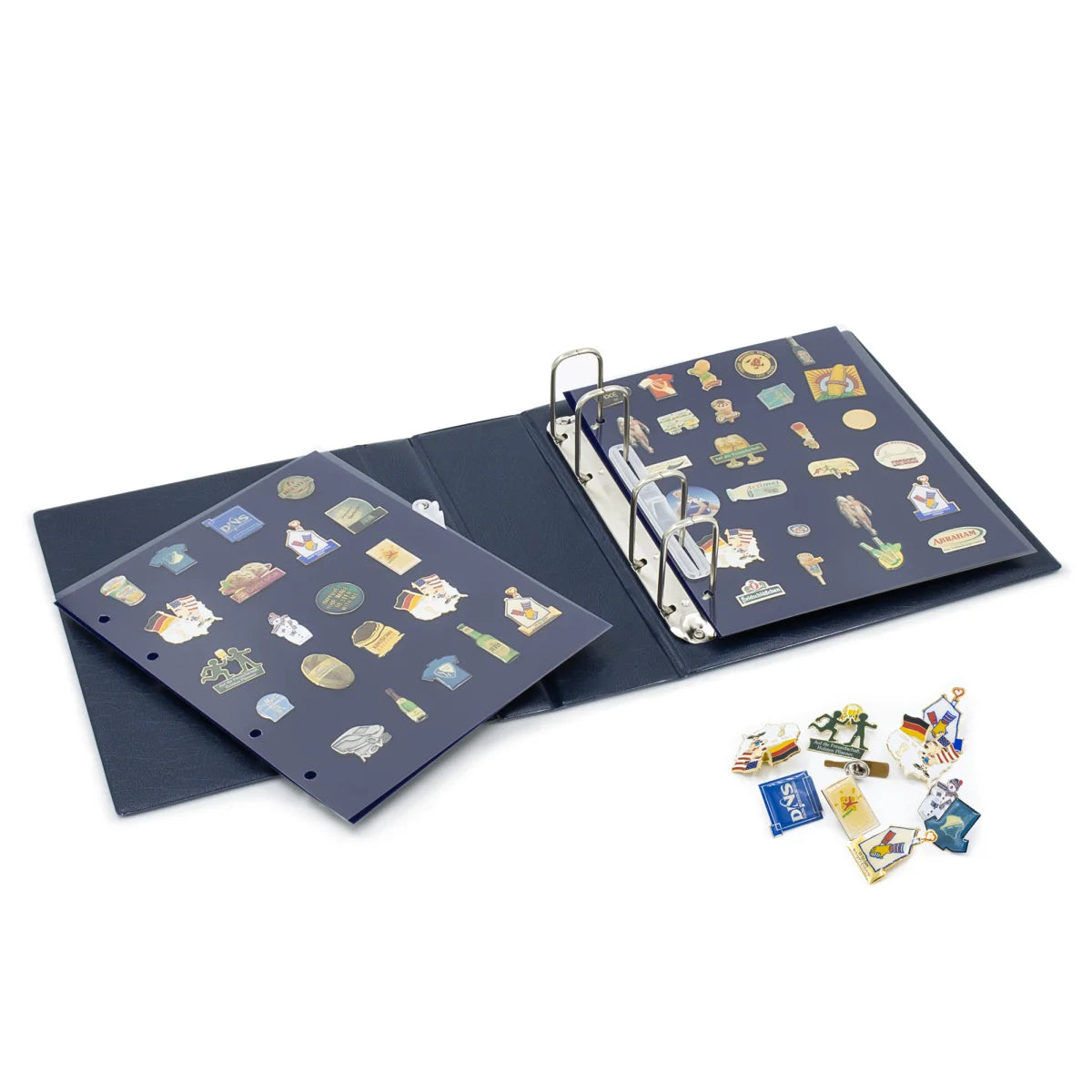 An open blue album showing various small collectible pins on velvet pages inside the clear protectors on a white background.