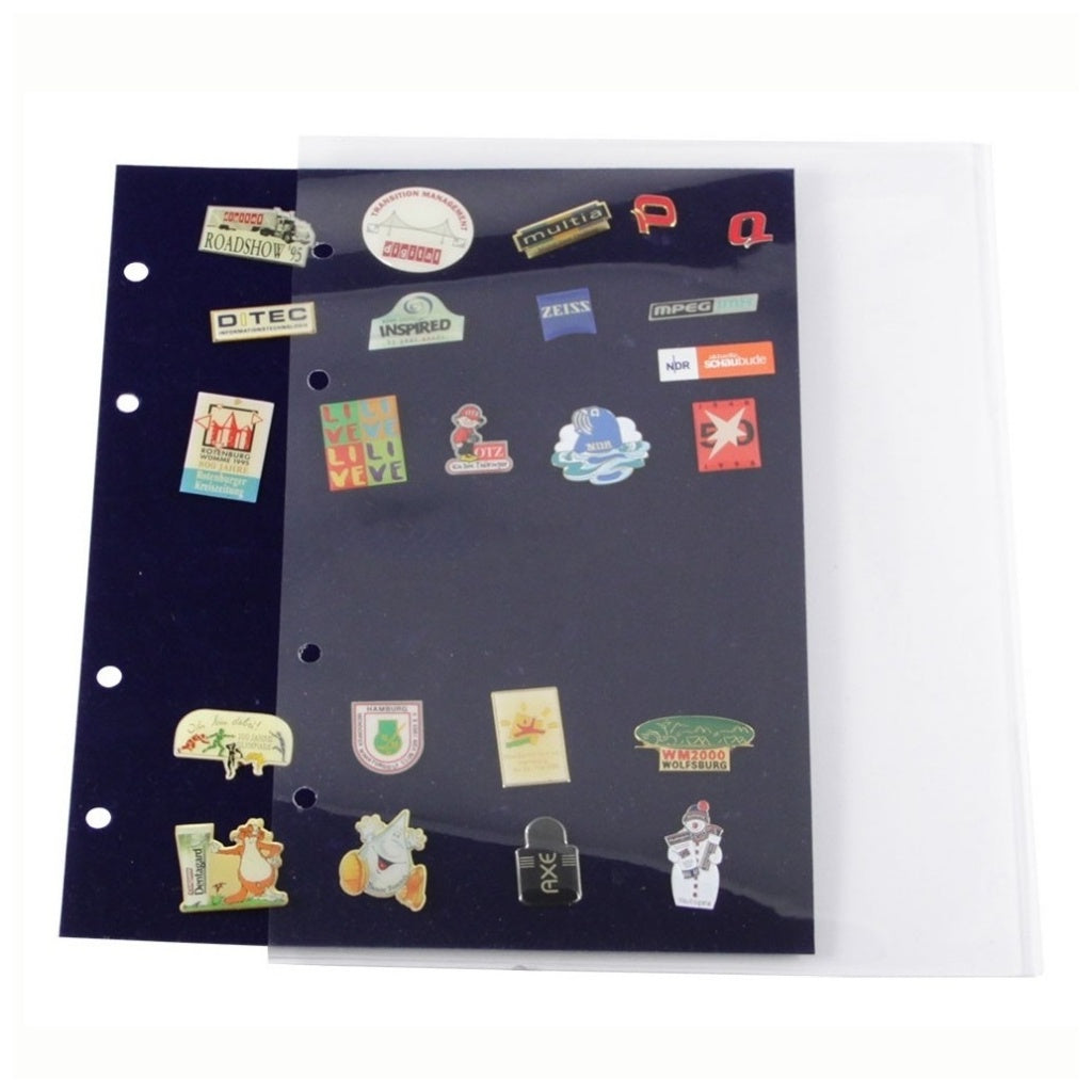 Collection of various small pins on a blue velvet page, half way inside a clear protector on a white background