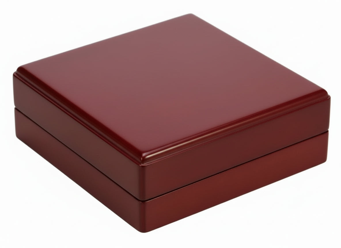 Closed wooden coin box on a white background