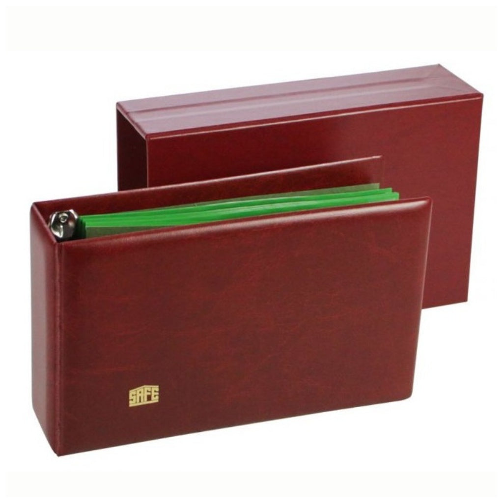 Closed red collector album with green pages alongside the matching slipcase on a white background