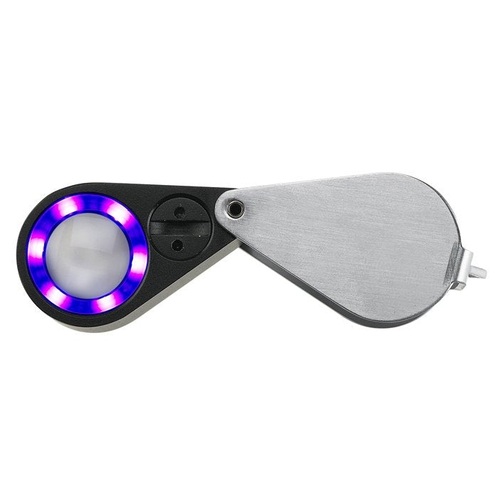 Handheld loupe magnifier with UV/LED ring light turned on, on a white background