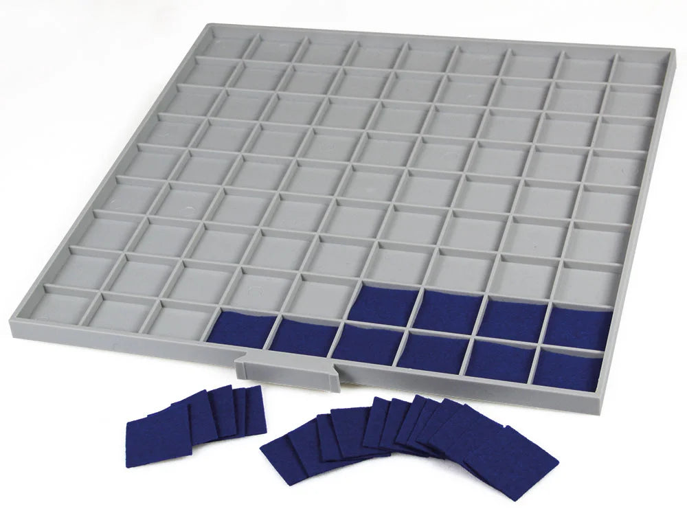 Gray grid tray drawer with red felt inserts on a white background
