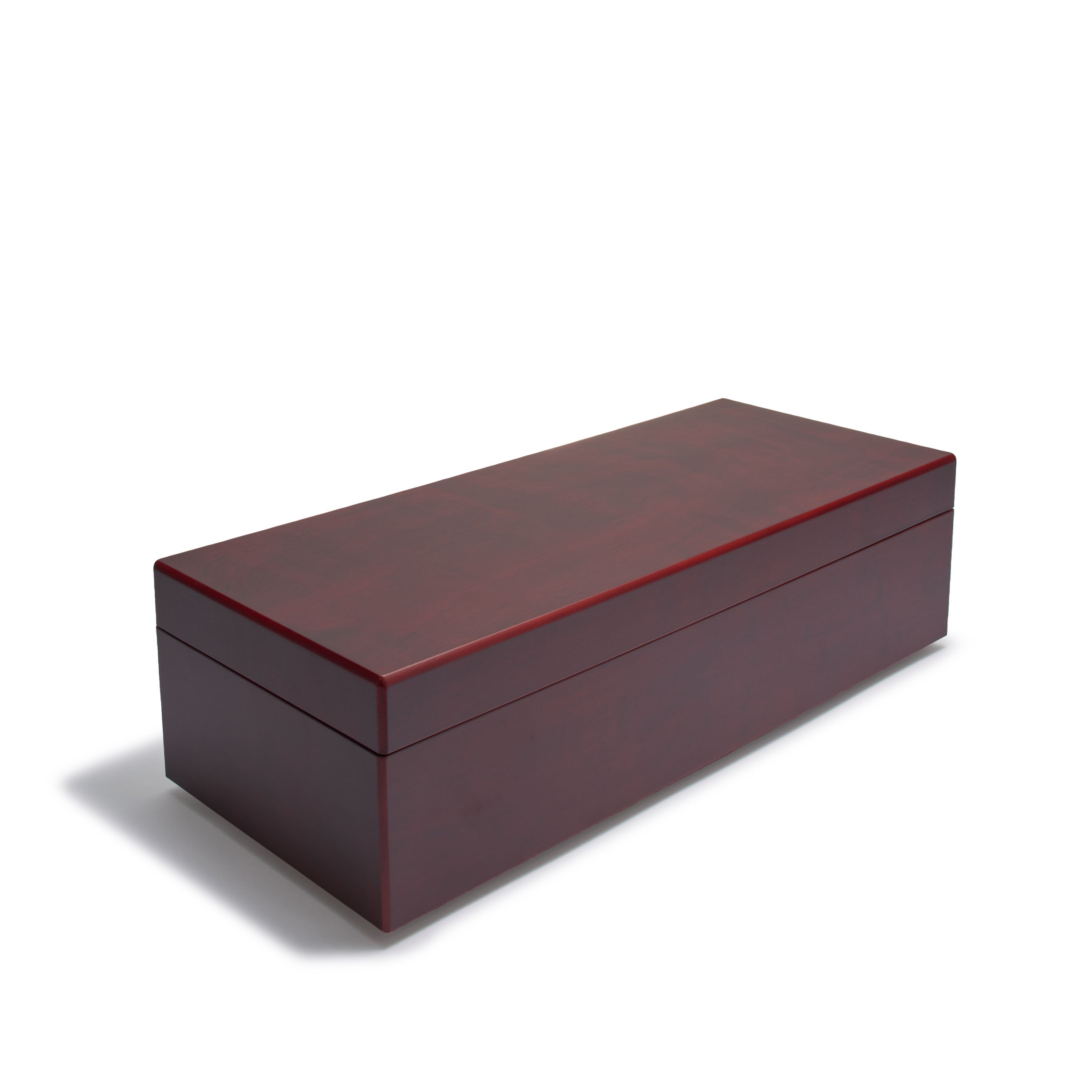 Closed wooden coin box with a red-brown finish on a white background