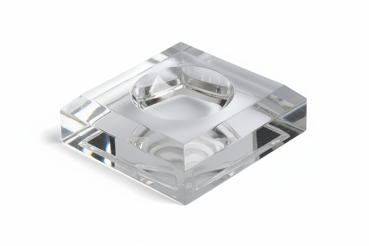 One clear acrylic dimple easel/stand on a white background