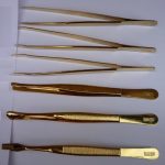 Gold tongs
